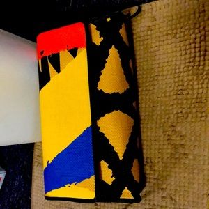 Multicolored textured clutch with handle